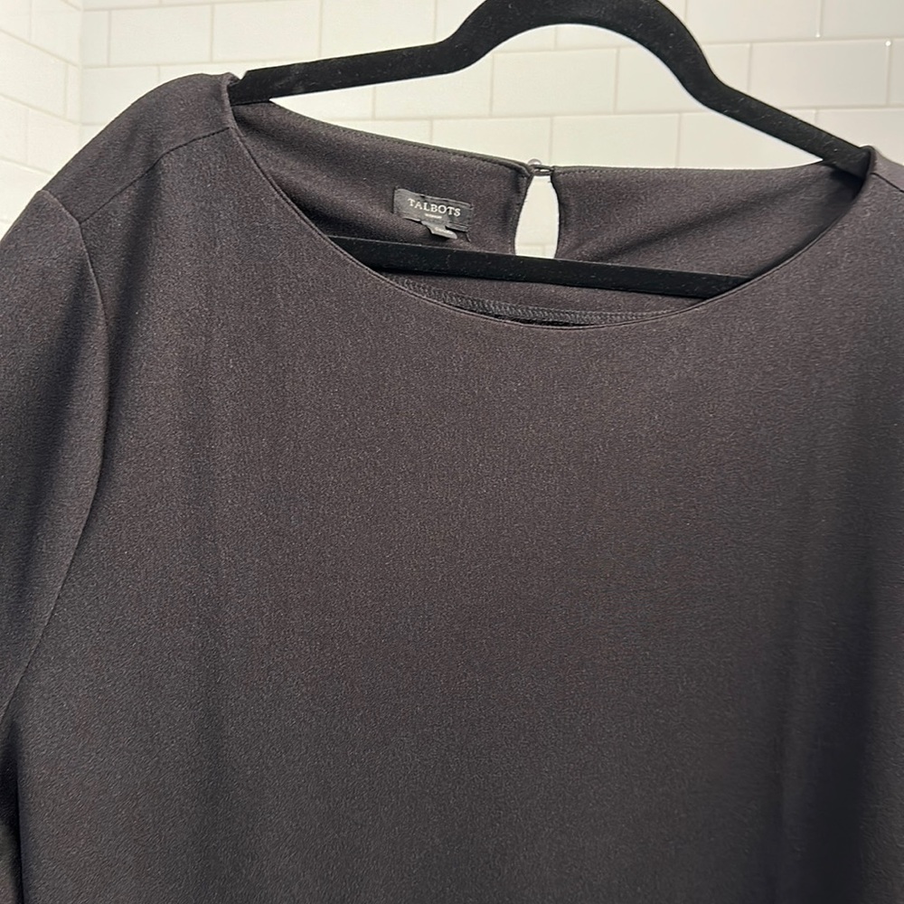 Black too with ruffled bell sleeves